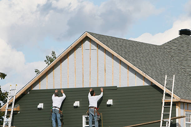 Professional Siding Installation technician working in Easton, MD